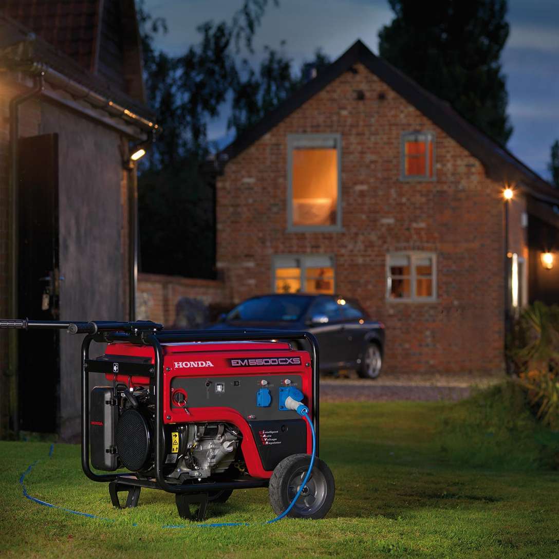Honda EG generator providing home back-up power at dusk
