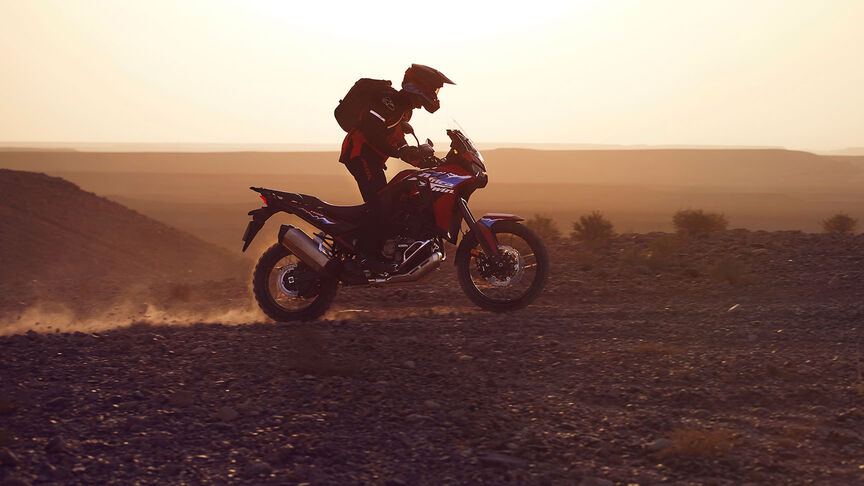 Honda Africa Twin riding through the desert